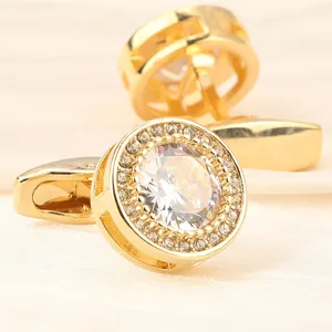 Boutons de manchette classiques en cristal doré pour homme, accessoire de chemise élégant.