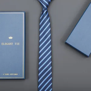 Classic blue striped necktie detail shot with elegant gift box, perfect for business formal wear.
