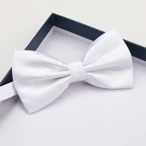 White checkered bow tie detail, elegant fabric texture for formal wear and weddings.
