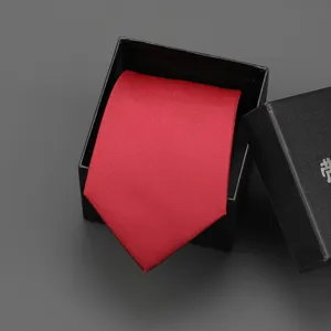 Classic solid red business tie packaged in a sleek black gift box, ideal for formal wear.