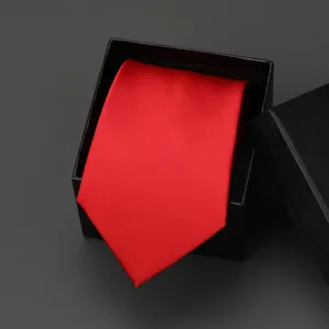 Red silk texture necktie detail shot in black gift box, elegant business accessory close up