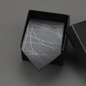 Dark grey men's business formal tie with geometric abstract lines in gift box detail