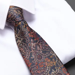 Mens paisley business necktie detail shot, elegant formal wear accessory for wedding and work.