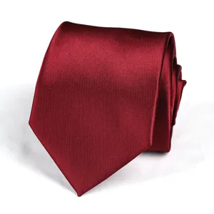 Classic burgundy red necktie detail shot, premium textured fabric for formal business wear.