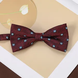 Close-up of men's business retro dark red jacquard bow tie with subtle blue square pattern details.