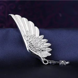 Retro silver wing brooch for men, elegant suit lapel pin and shirt collar accessory.