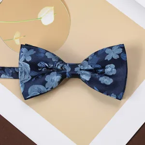 Detail view of the elegant navy blue floral jacquard bow tie, perfect for business formal wear.