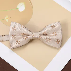 Detail shot of a vintage men jacquard bow tie with elegant floral pattern for formal wear.