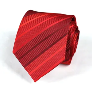 Wine red striped tie detail, classic narrow business necktie for wedding groom or formal wear.