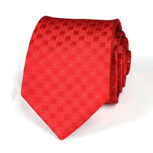 Wine red business necktie detail shot, showing fine geometric woven grid pattern texture.