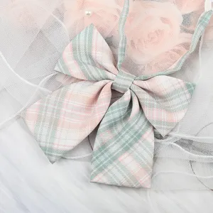 Japanese JK style pink green plaid bow necktie ribbon sailor uniform shirt accessory detail.