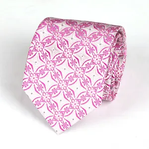 Detailed view of rolled silver necktie featuring vibrant magenta floral woven pattern texture.