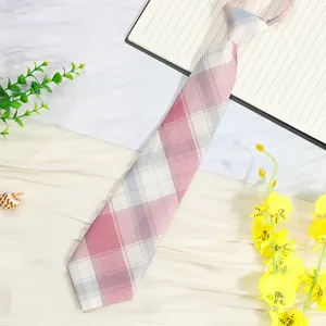 Close-up detail view of a Japanese pre-tied plaid tie, featuring a pink and gray pattern.
