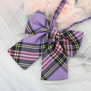 Detailed view of a stylish purple plaid JK uniform bow tie with long ribbons, perfect for sailor shirts.