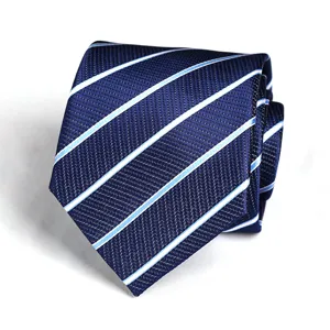 Detailed closeup of a dark blue men necktie featuring white and light blue stripes.