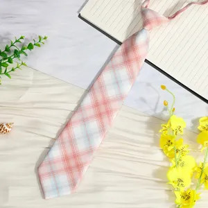 Detailed shot of Japanese style pink plaid pre-tied necktie, perfect for JK uniform shirts.
