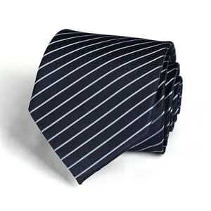 Close up detail of a classic dark blue necktie with light blue diagonal stripes pattern.