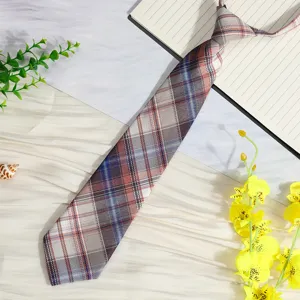 Details of the Japanese JK plaid necktie featuring a pre-tied design for easy wear.