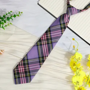 Close-up detail of the purple plaid JK uniform necktie showing fine woven fabric texture.
