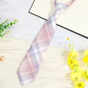 Close-up detail of the pink and blue plaid JK uniform necktie with clean stitching lines.