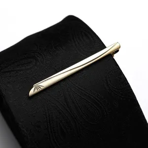Elegant gold tie clip for men business suits, featuring a slim sleek metallic design.