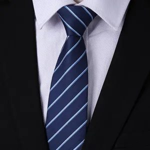 Close-up detail of a classic navy blue striped business tie with white and light blue lines.