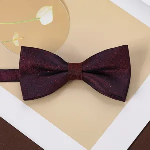 Burgundy glitter men bow tie detail view, classic retro style for formal suit shirts and weddings.