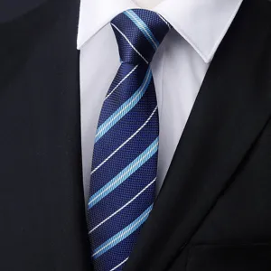 Classic men's blue striped tie with white shirt and black suit for business formal wear.