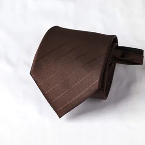 Detail shot of brown striped zipper tie showing fabric texture and neat fold presentation.