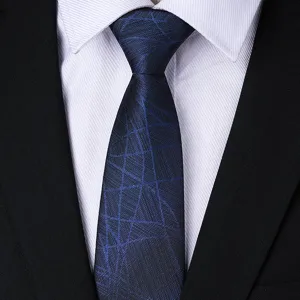 Close-up detail shot of professional blue geometric pattern business necktie matched with suit.