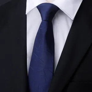 Close-up of a dark blue men's business formal tie with subtle geometric lines. Ideal.