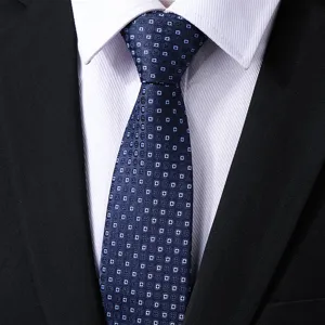 Detailed shot of a classic dark blue geometric patterned necktie for men's formal business wear.