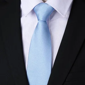 Men's light blue business formal tie detailed view, classic twill fabric for suit matching.