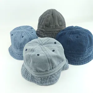 Detailed view of children's washed denim bucket hats in various colors, soft and breathable.