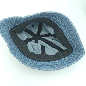 Denim bucket hat interior detail showing neat stitching, breathable lining and comfortable band.