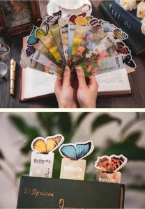 Detailed view of 3D butterfly bookmarks in a styled setting, showcasing vibrant wing patterns.