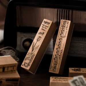 Vintage wooden rubber stamps set with musical and botanical designs for journal DIY crafting