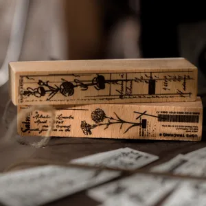 Vintage wooden rubber stamps with botanical flower design for DIY journal planner arts crafts.