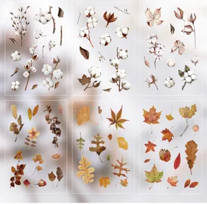 Detailed view of botanical PET stickers featuring watercolor cotton and autumn leaves for DIY crafting.