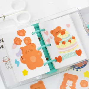 Mini loose-leaf notebook with cute orange bear PVC transfer stickers, perfect for DIY journaling.