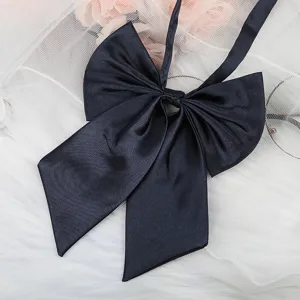 Dark blue satin JK bow tie detail shot, showing smooth texture and exquisite craft for uniform.