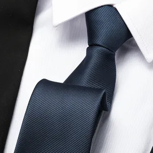 Men business professional navy blue diagonal striped necktie formal suit dress accessory detail view