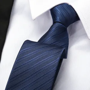 Blue striped necktie detail showcasing fine fabric texture and classic business style.