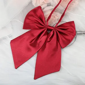 Red satin JK bow tie uniform ribbon accessory for women girls sweet sailor shirt decor.