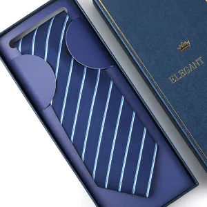 Men's formal striped necktie in gift box, elegant business wedding suit tie accessory detail.