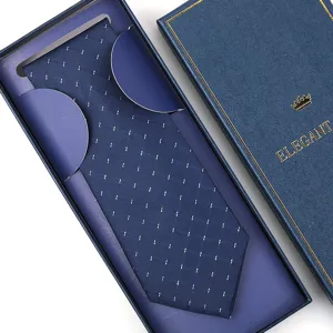 Navy blue dotted necktie for men in a gift box, ideal for weddings and formal wear.