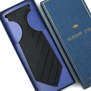 Close-up detail of a classic black striped men's necktie presented neatly inside a luxury gift box.