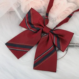 JK plaid bow tie detail shot, red ribbon collar accessory for sailor shirt and uniform.