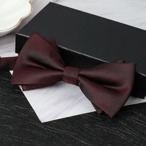 Detail view of men's wine red and black double layer striped bow tie for formal suit