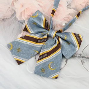 JK style navy blue striped bow tie collar accessory with moon and star pattern details.